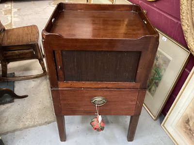 Lot 1073 - George III mahogany beside cupboard, with pierced gallery and enclosed by tambour slide with pot drawer below, on square legs, 48cm wide 44cm deep x 78cm high