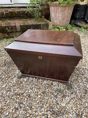 Lot 1285 - 19th century mahogany sarcophagus form wine cooler, with flanking mask handles on paw feet, lacking contents, 51cm wide