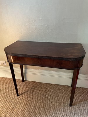 Lot 1258 - Regency mahogany D-shaped card table, with reeded edge on square tapered legs, 81cm wide x 45cm deep x 72cm high