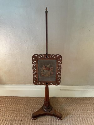 Lot 1239 - Regency rosewood pole screen, with rising embroidery banner, on platform base