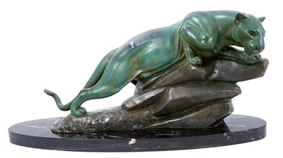 Lot 597 - M. Leducq: A patinated spelter model of a panther crouched upon a rock, signed, on oval marble plinth