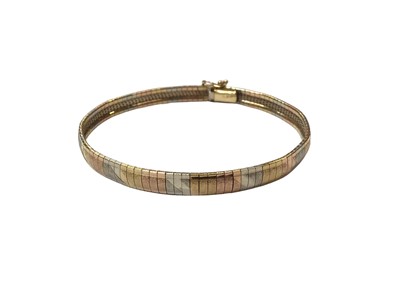 Lot 1013 - 18ct tri-colour gold bracelet, 19cm long