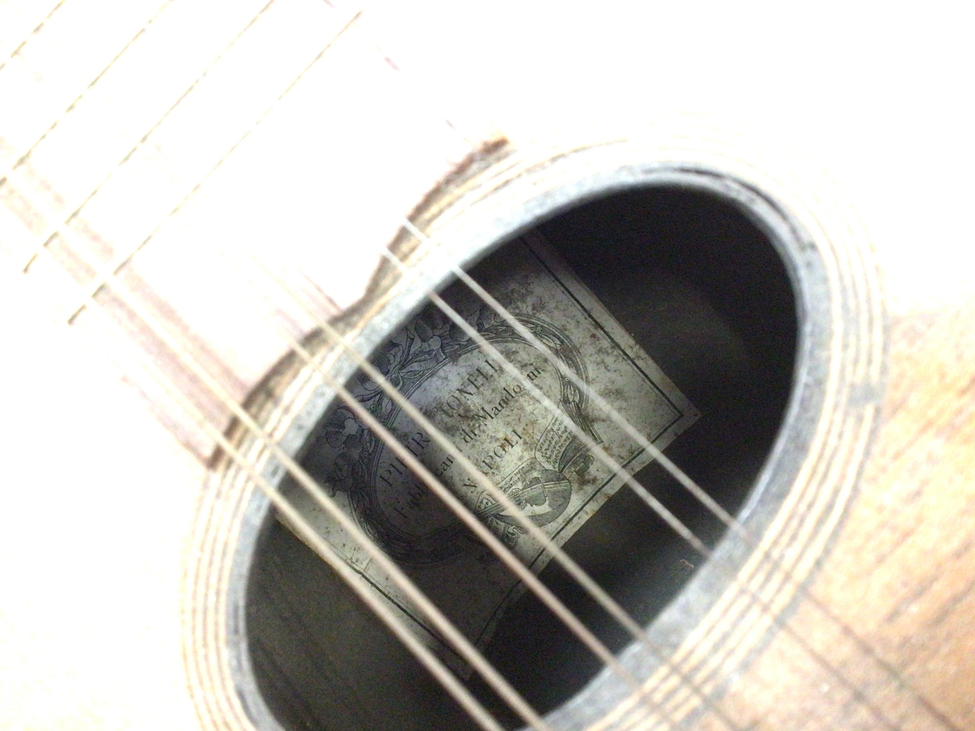 Lot 27 - Old Mandolin with paper label to interior