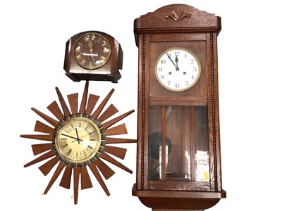 Lot 368 - Anstey Wilson wooden starburst wall clock, Smiths mantle clock and a regulator wall clock (3)