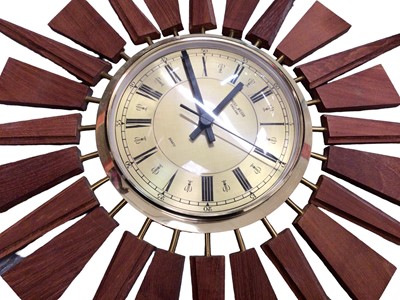 Lot 368 - Anstey Wilson wooden starburst wall clock, Smiths mantle clock and a regulator wall clock (3)