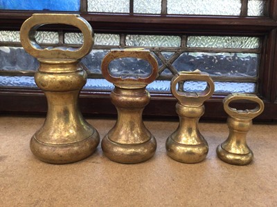 Lot 73 - Set of four brass butchers bell weights