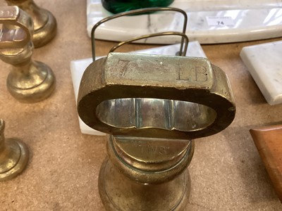 Lot 73 - Set of four brass butchers bell weights