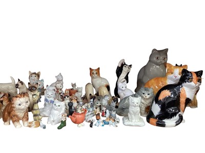 Lot 621 - Collection of cat ornaments, various manufacturers including Sylvac and Coopercraft - 1 shelf