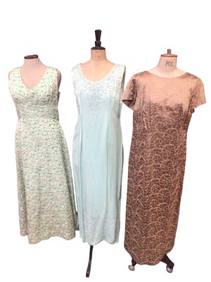 Lot 2055 - 1960's dress selection including Carnegie pale blue dress with cord-work embroidery, purple psychedelic maxi dress, abstract green and navy dress with bolero by D.L.Barron,  mink satin dress with e...