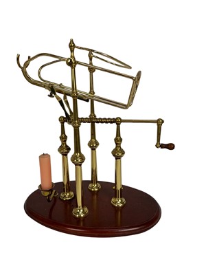 Lot 36 - Good quality French brass and mahogany decanting cradle