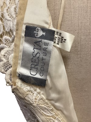 Lot 2060 - Selection of 1960's clothing including black wool dress by Dolly Rockers, cream lace top dress by Cresta, pink crepe column dress with silver dots by Blanes, column dress with side button detail  a...