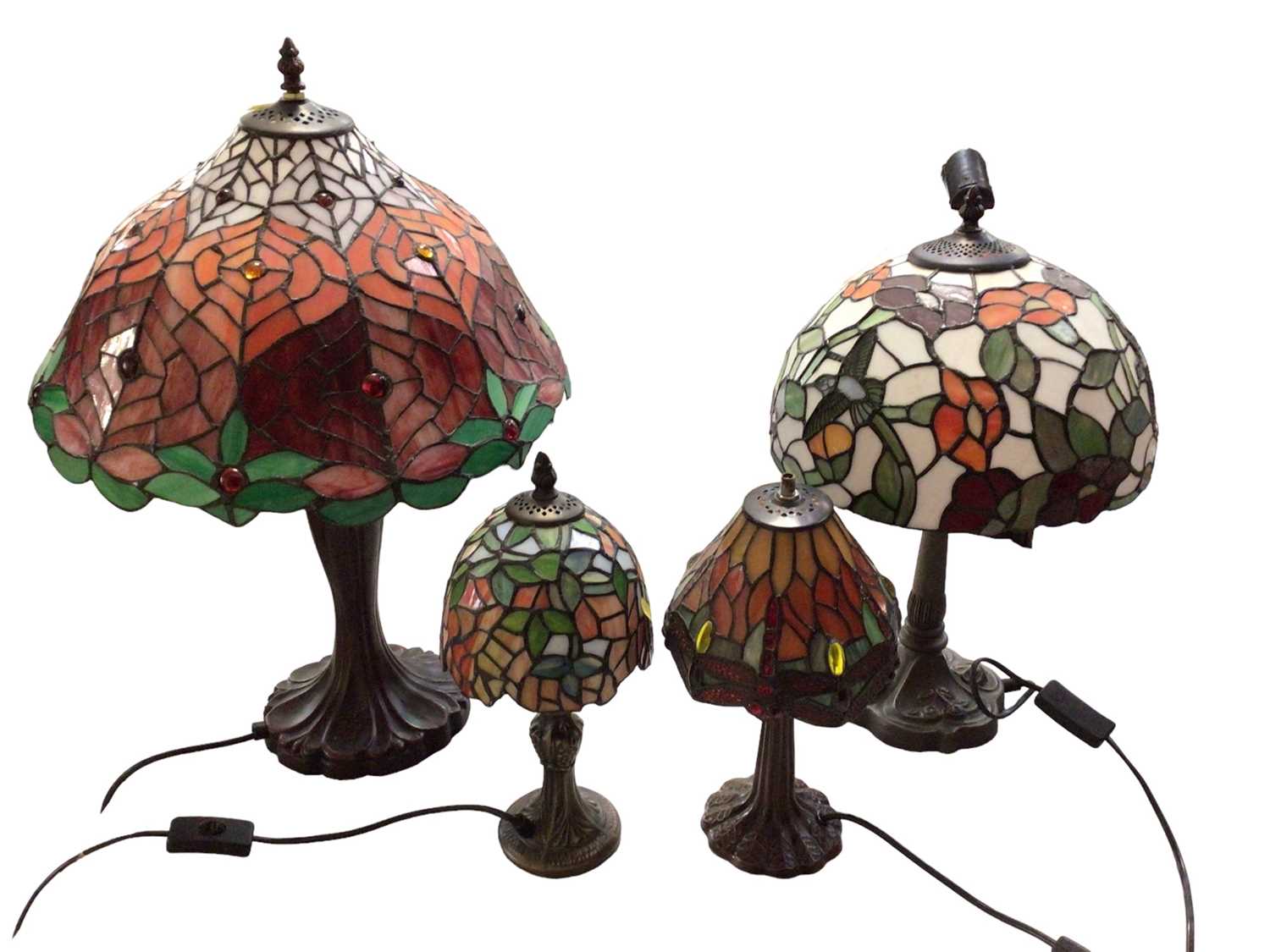 Lot 300 - Four Tiffany style table lamps