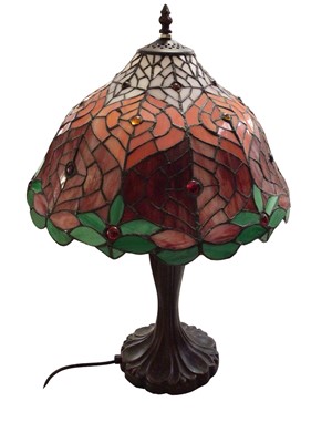 Lot 300 - Four Tiffany style table lamps