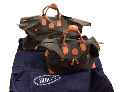 Lot 306 - Two Bric's carry-on holdall bags in dust bags, various other bags, Mulberry brown suede cushion, other cushions, blankets, throws etc