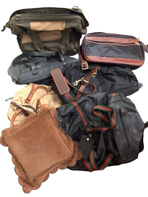 Lot 306 - Two Bric's carry-on holdall bags in dust bags, various other bags, Mulberry brown suede cushion, other cushions, blankets, throws etc