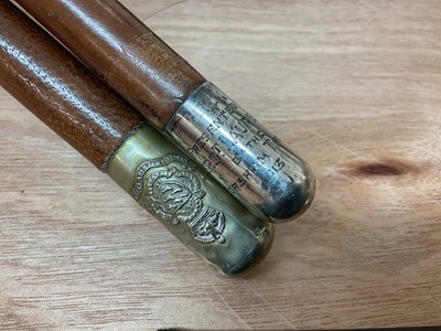 Lot 817 - Sussex Yeomanry military horse whip with engraved regimental badge and silver mount,  together with another similar and a pair of military boots.