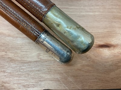 Lot 817 - Sussex Yeomanry military horse whip with engraved regimental badge and silver mount,  together with another similar and a pair of military boots.
