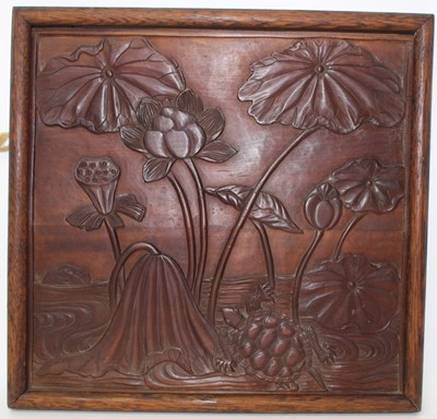 Lot 609 - Antique Chinese relief carved wooden plaque, depicting a tortoise and lotus flowers