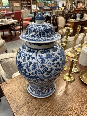Lot 30 - 18th century Chinese blue and white baluster vase and cover, with phoenix ornament.