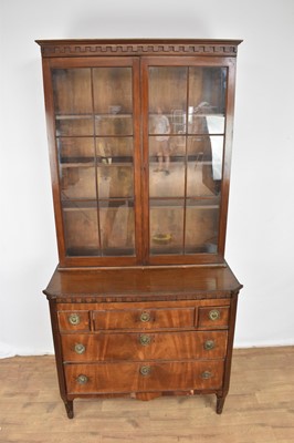 Lot 1205 - Early 19th century Dutch mahogany dressing chest of drawers with associated bookcase top.