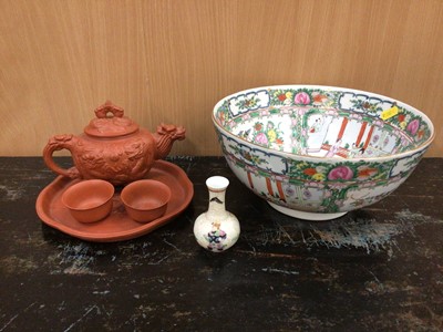 Lot 105 - Chinese Yixing teapot, tray and two tea bowls, marked, with a Canton bowl and a famille rose vase