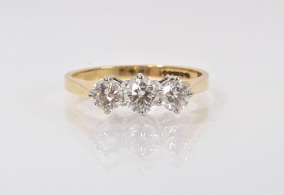 Lot 326 - Diamond three stone ring