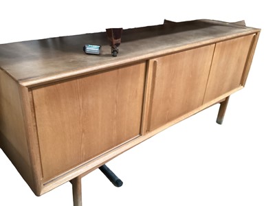 Lot 1204 - Mid century Danish sideboard bearing label Mobelfabik, Eskilstrup, Falster, with sliding doors, 182cm wide, 46cm deep, 80cm high