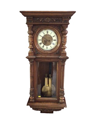 Lot 322 - Late 19th Century Vienna Regulator wall clock in carved walnut case (pendulum and two weights present)