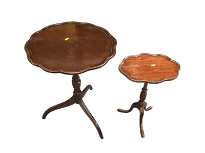 Lot 1211 - Two mahogany wine tables together with another