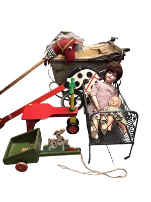 Lot 334 - Armand Marseille doll with bisque head marked Germany 390 A. 9. M, composite body and limbs, together with one other vintage doll, a metal doll's bed, pram, hobby horse etc