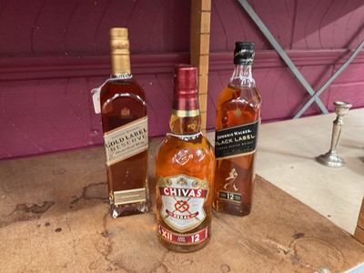 Lot 420 - Three bottles of Whisky Johnnie Walker Black Label, 70cl, Johnnie Walker Gold Label, 70cl and Chivas Regal, 70cl (3 bottles).