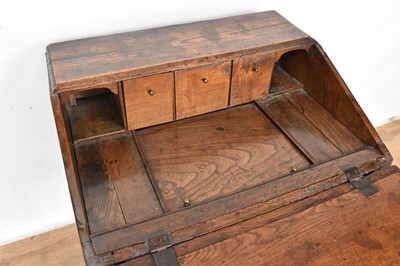 Lot 1215 - Mid-18th century oak desk