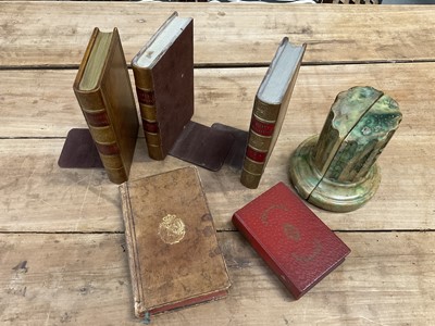 Lot 1219 - Pair of book form bookends, faux book box, and other book ends