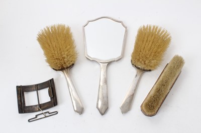 Lot 220 - Art Deco silver mounted dressing table brushes and mirror,  and a silver and enamelled buckle