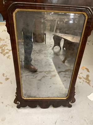 Lot 1283 - 18th century walnut fret carved wall mirror