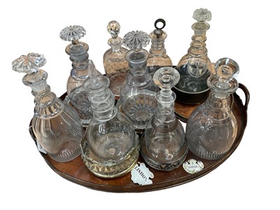 Lot 1328 - Collection of 19th century lidded glass decanters and decanter stands, housed on mahogany tray