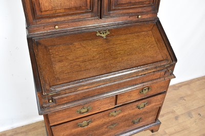 Lot 1334 - Early 18th century oak bureau bookcase