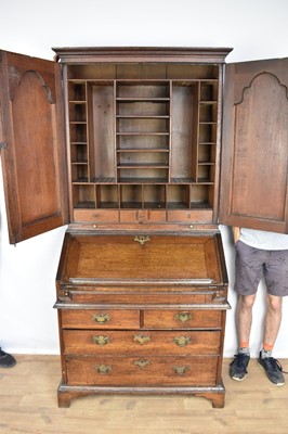 Lot 1334 - Early 18th century oak bureau bookcase