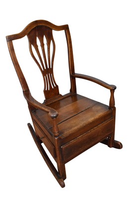 Lot 1336 - Georgian oak and elm lambing chair, on rocker supports