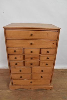 Lot 1339 - Pine small cabinet of sixteen drawers