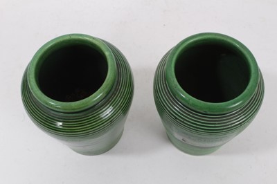 Lot 1350 - Pair of early 19th century green glazed pottery tea caddies, retailers name ‘L Morel 210 & 211 Piccadilly