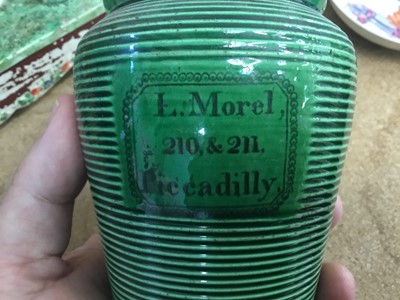 Lot 1350 - Pair of early 19th century green glazed pottery tea caddies, retailers name ‘L Morel 210 & 211 Piccadilly