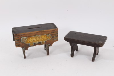 Lot 1352 - Miniature stool together with a Victorian novelty money box with impressed motto -'wee marjorie is no fool, she puts her pennies in her stool’