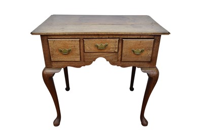 Lot 1373 - George II walnut oak low boy