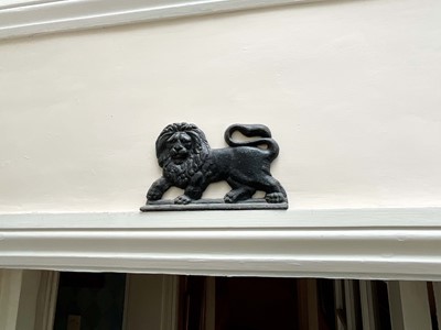 Lot 1375 - Cast iron lion plaque