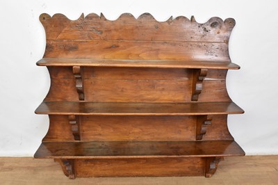 Lot 1385 - 19th century Continental fruitwood hanging wall shelf