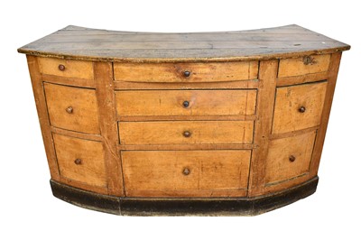 Lot 1386 - Unusual 19th century French fruitwood shop counter of arched form, with money slot