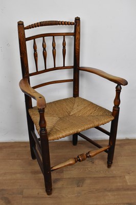 Lot 1387 - 19th century elm spindle back elbow chair