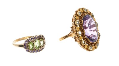 Lot 350 - Victorian style amethyst and diamond cluster ring and a peridot and amethyst cluster ring (2)