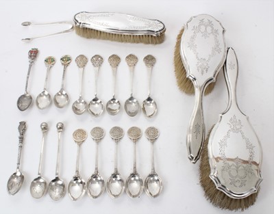 Lot 224 - 16 silver spoons and sugar tongs and three silver brushes